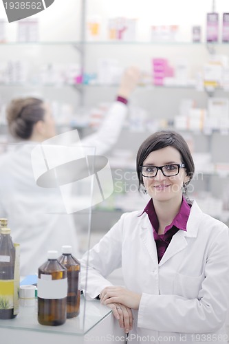 Image of team of pharmacist chemist woman  in pharmacy drugstore