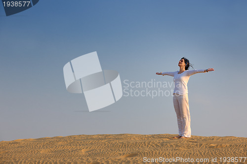 Image of woman relax in desert