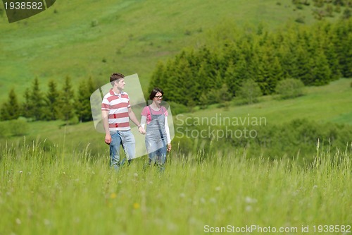 Image of romantic young couple in love together outdoor