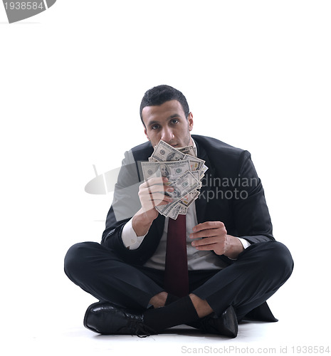 Image of Business man holding money