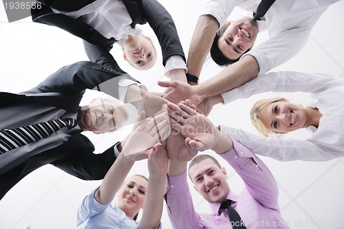 Image of business people group joining hands