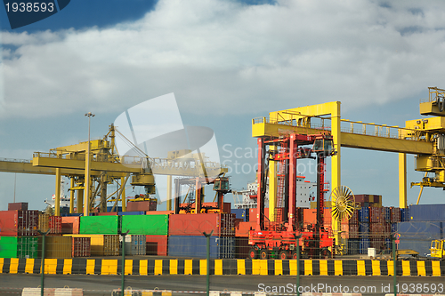 Image of container ship leaving the container port terminal