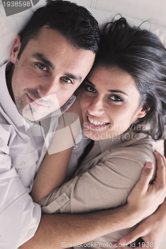 Image of happy young couple relax at home