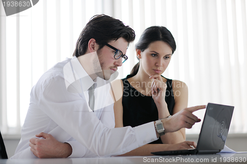 Image of business people in a meeting at office