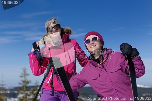 Image of winter season fun with group of girls