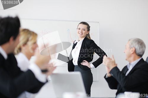 Image of Group of young business people at meeting