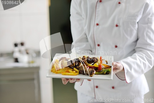 Image of chef preparing meal