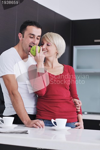 Image of young couple have fun in modern kitchen