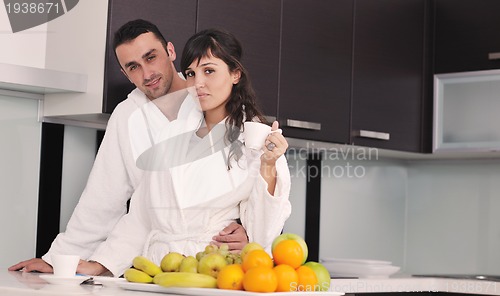 Image of young couple have fun in modern kitchen