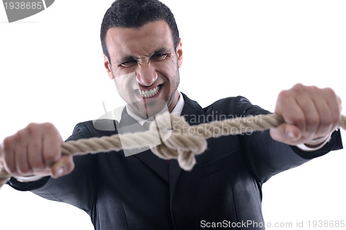 Image of business man with rope isolated on white background