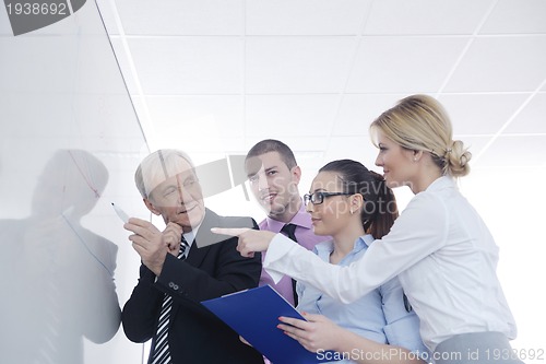 Image of Senior business man giving a presentation