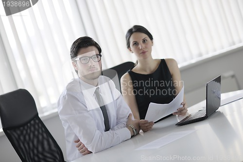 Image of business people in a meeting at office