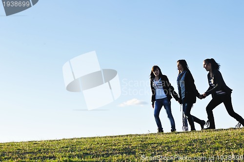 Image of group of teens have fun outdoor