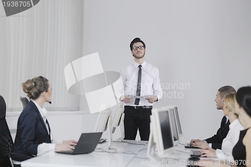 Image of business people group working in customer and help desk office