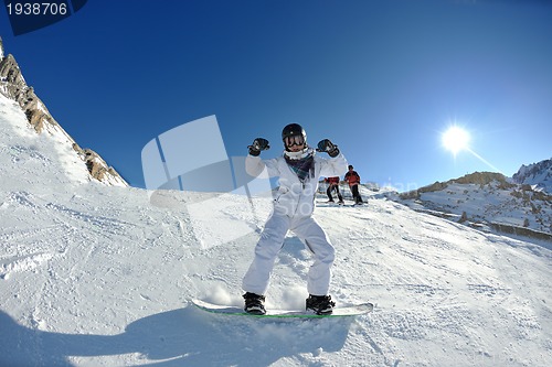 Image of skiing on fresh snow at winter season at beautiful sunny day