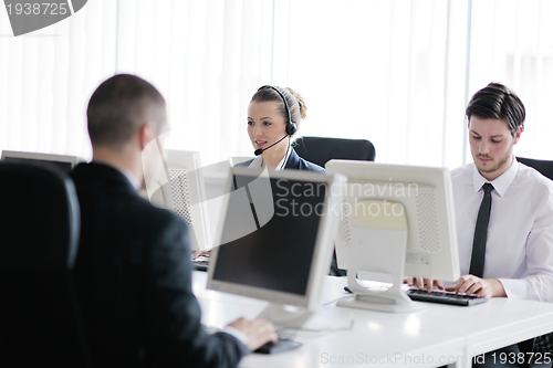 Image of business people group working in customer and helpdesk office