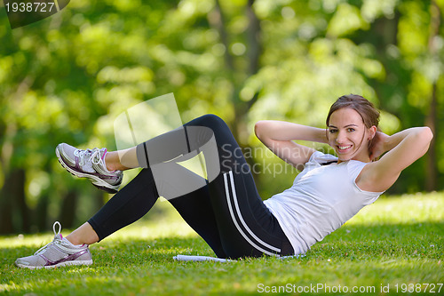 Image of woman stretching before fitness