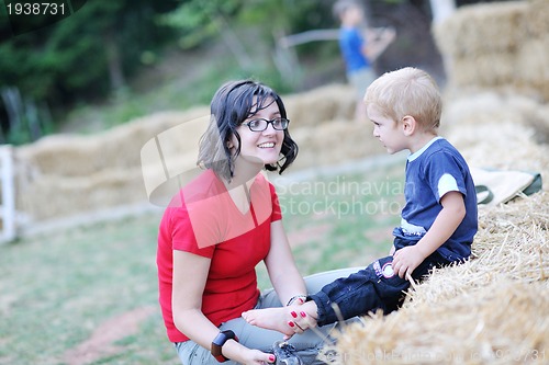 Image of woman and child have fun outdoor