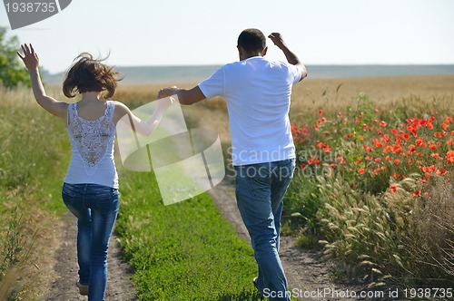 Image of happy couple in wheat field