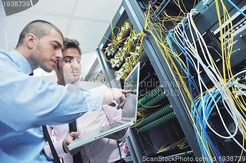 Image of it enineers in network server room