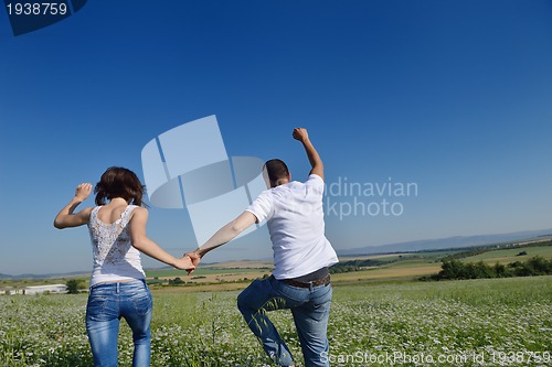 Image of happy couple in wheat field