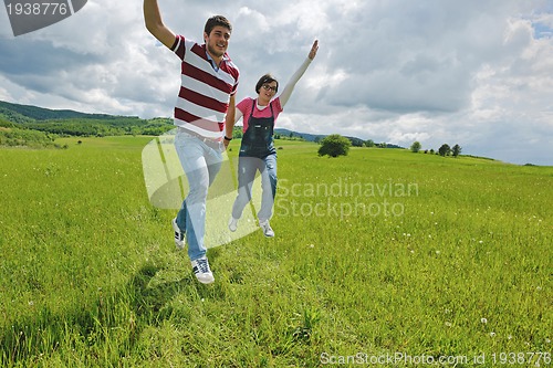 Image of romantic young couple in love together outdoor