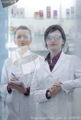 Image of team of pharmacist chemist woman  in pharmacy drugstore