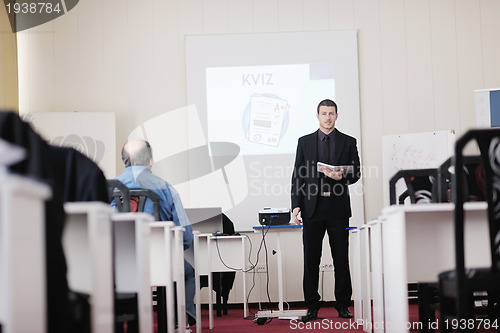 Image of business man on seminar