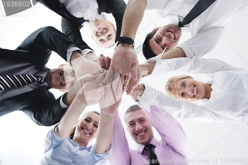 Image of business people group joining hands