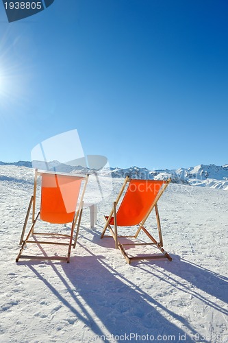 Image of wooden chair on top of mountaint