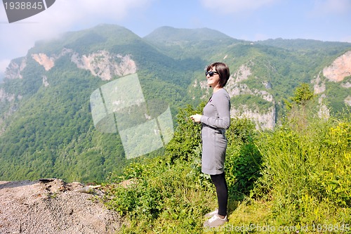 Image of happy young woman portrait in nature