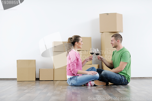 Image of Young couple moving in new house