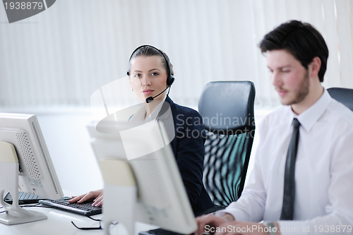 Image of business people group working in customer and helpdesk office