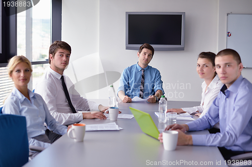 Image of business people in a meeting at office