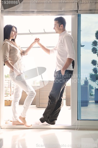 Image of happy young couple relax at home
