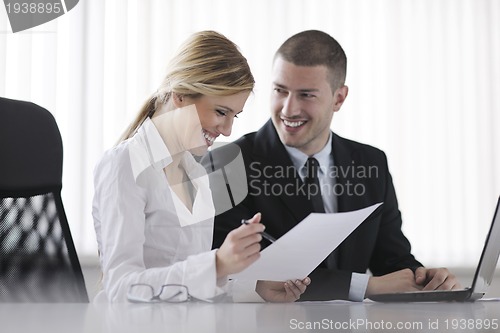 Image of business people in a meeting at office