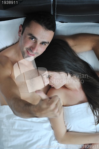 Image of young couple have good time in their bedroom