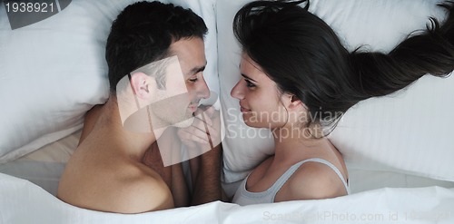 Image of young couple have good time in their bedroom