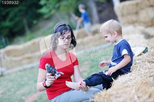 Image of woman and child have fun outdoor