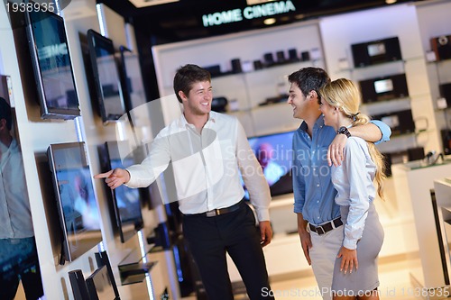 Image of people buy  in consumer electronics store