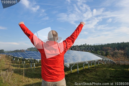 Image of Male solar panel engineer at work place