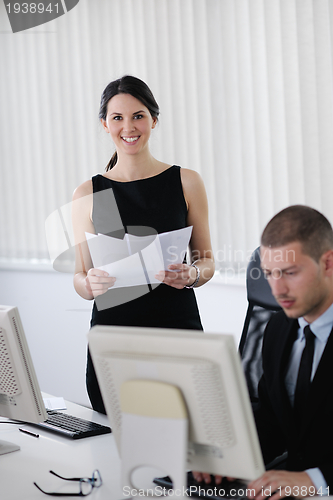 Image of business people in a meeting at office