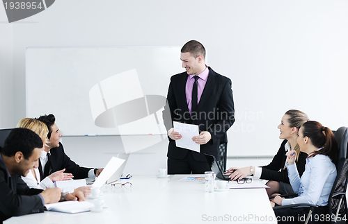 Image of Group of young business people at meeting
