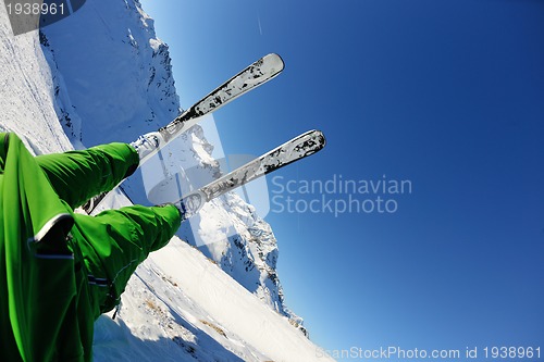 Image of skiing on fresh snow at winter season at beautiful sunny day