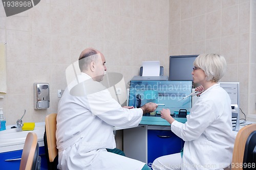 Image of veterinarian and assistant in a small animal clinic