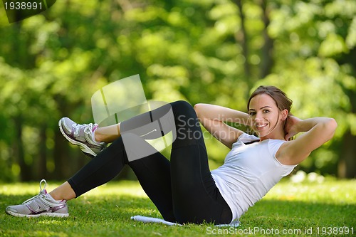 Image of woman stretching before fitness