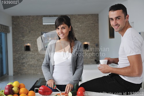 Image of young couple have fun in modern kitchen