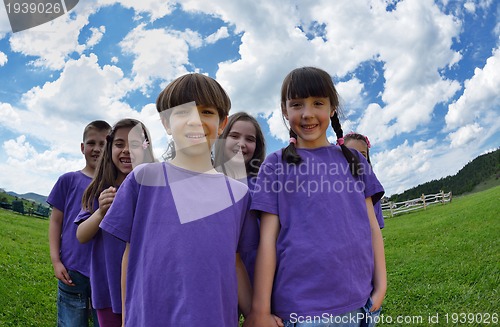 Image of happy kids group  have fun in nature