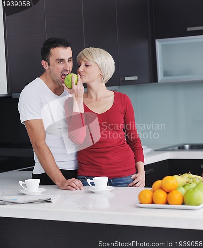 Image of young couple have fun in modern kitchen