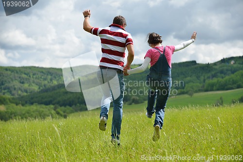 Image of romantic young couple in love together outdoor